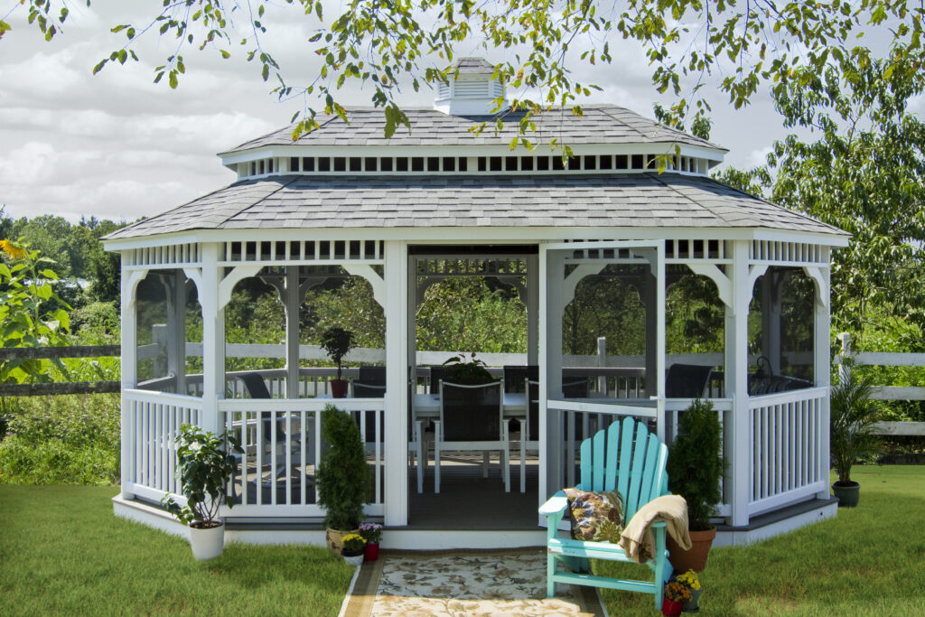 oval white vinyl gazebo with a pagoda roof and cupolas