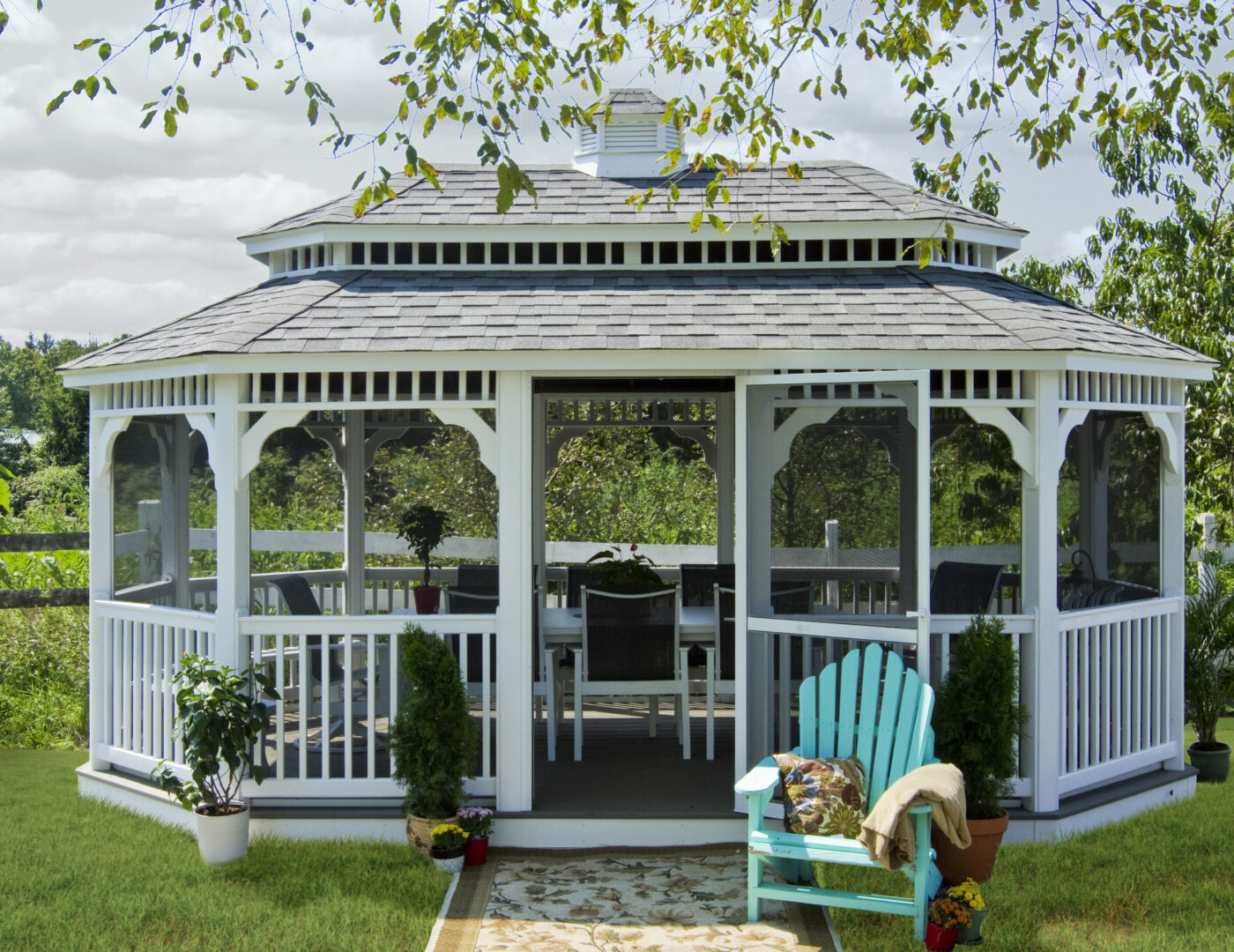 oval white vinyl gazebo with a pagoda roof and cupolas