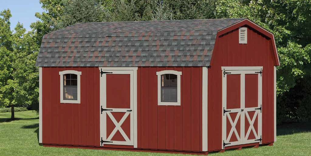 red dutch barn shed with white trim